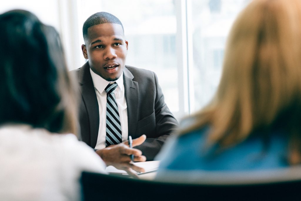 Two women at a meeting with an advisor